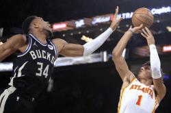 爱游戏官方-包含西班牙男篮完胜湖人，字母哥制霸全场的词条